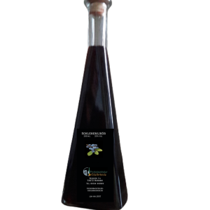 Schlehenlikör (25% vol) in Schmuckflasche Fantasie – Silberne Kammerpreismünze