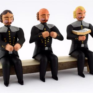 3 sitzende Bergleute auf Bank